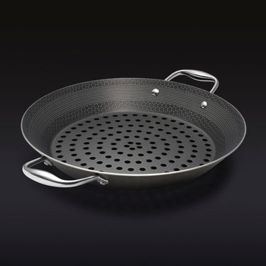 The HexClad 12&quot Hybrid BBQ Grill Pan on a black background